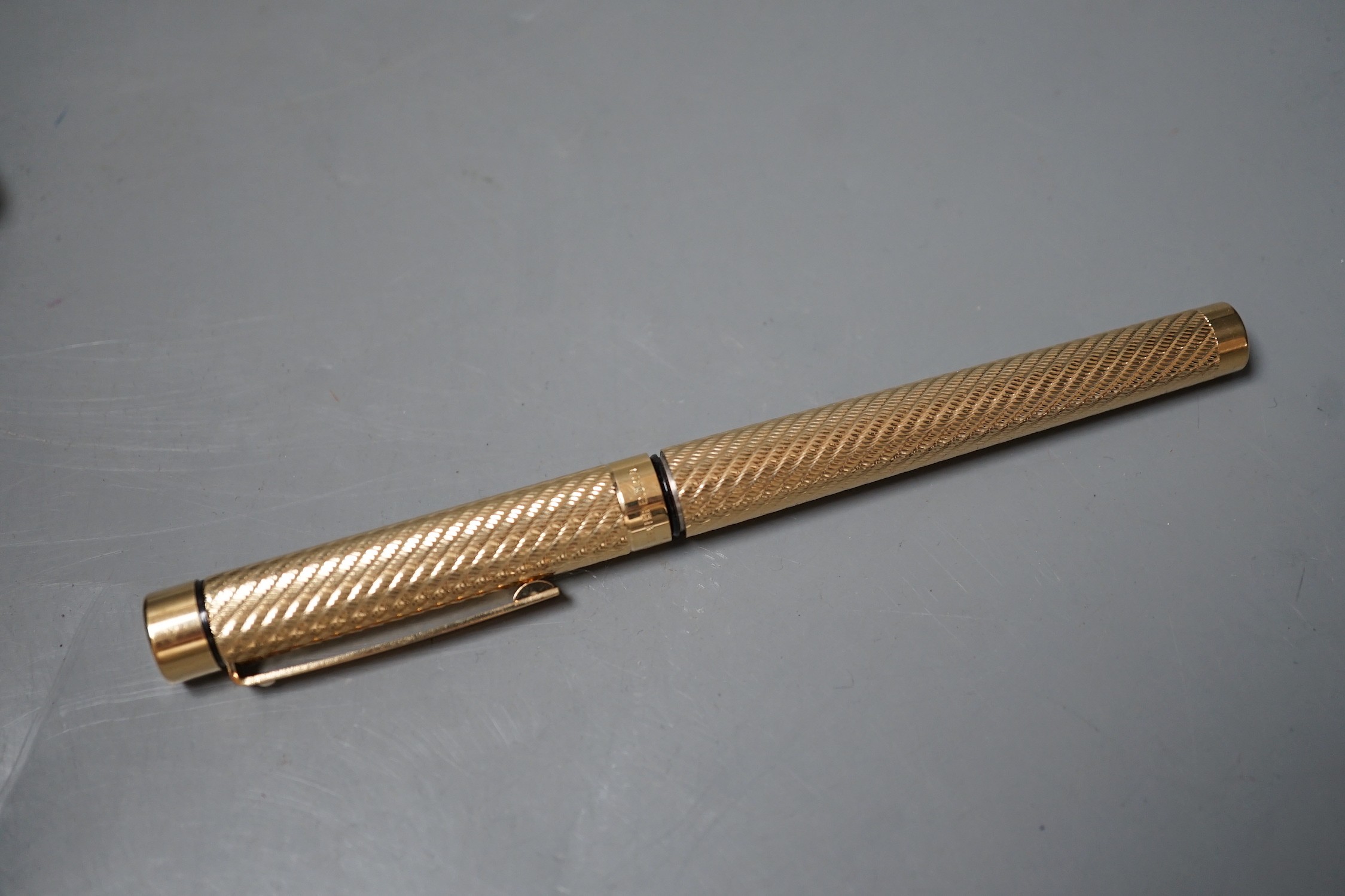 A cased gold plated Shaeffer fountain pen